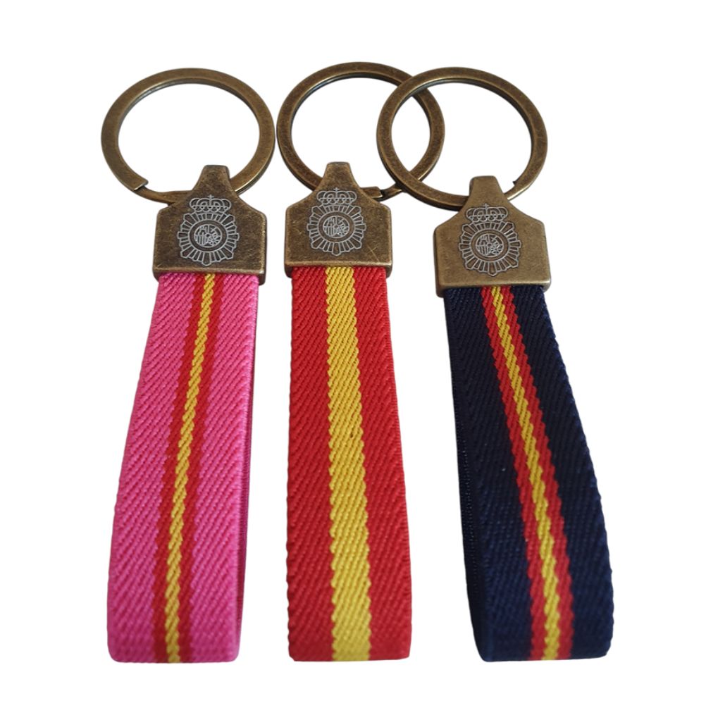 3 LLAVEROS GRABADOS DEL CNP . ESPAÑA FUCSIA Y AZUL MARINO. 3 LLAVEROS GRABADOS DEL CNP . ESPAÑA FUCSIA Y AZUL MARINO.