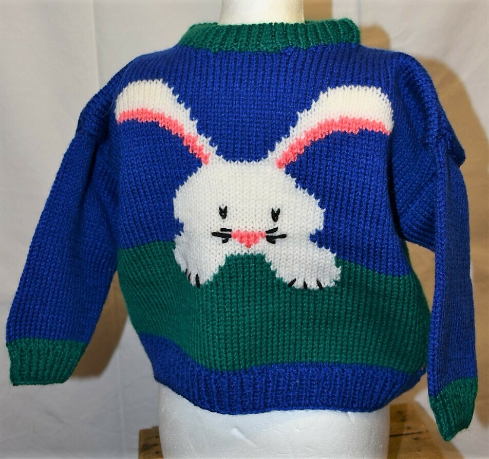 Lapin sur fon bleu-vert