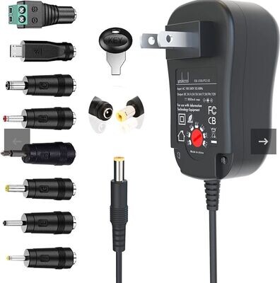 Adaptador universal de pared multivoltaje Yoshicool 12W con 8 puntas.