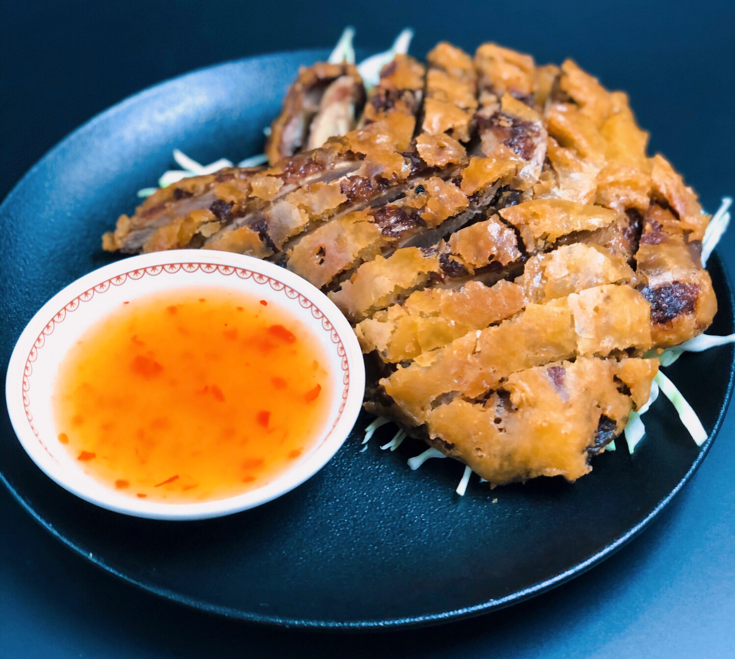 57. FRIED CRISPY DUCK