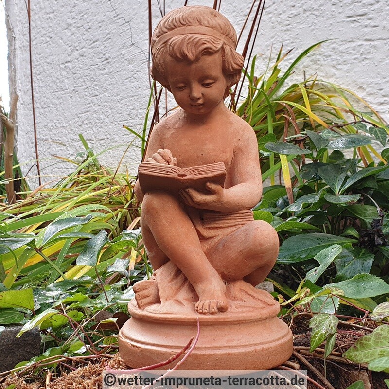 Junge mit Buch, Höhe 30 cm