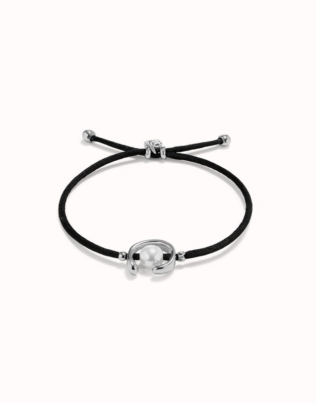 Pulsera de hilo negro con perla shell fornitura bañada en plata de ley.
