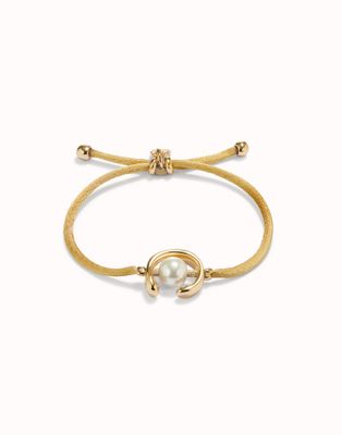 Pulsera de hilo camel con perla shell fornitura bañada en oro 18k.,