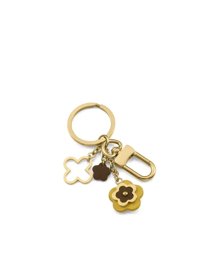 Llavero de mujer de acero Ip dorado y piel con cadenas y colgantes en forma de flor