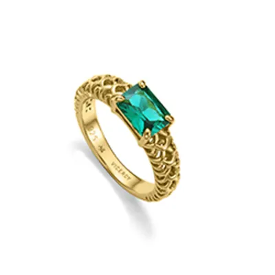 Anillo plata de primera ley con baño de oro con diseño calado con una circonita baguette verde
