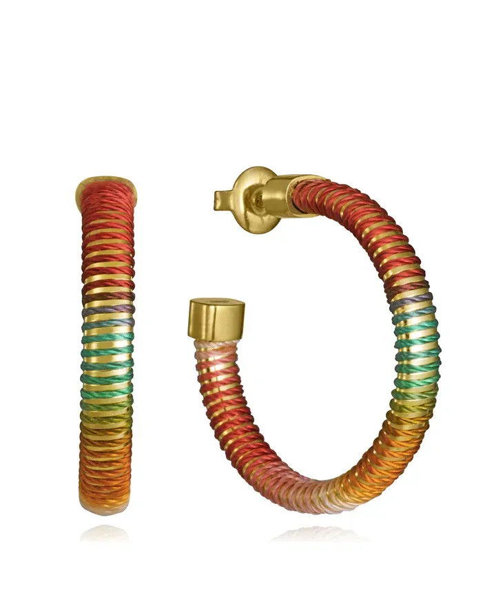 Pendientes de acero aro abierto de tubogas con cordón enroscado, colección Laura Escanes Pendientes de acero aro abierto de tubogas con cordón enroscado, colección Laura Escanes