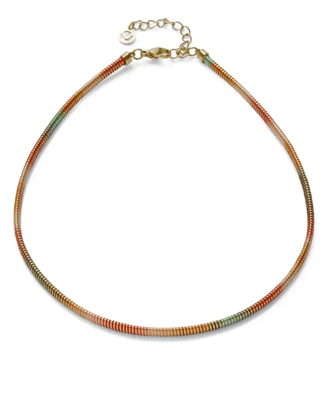 Collar de acero Ip dorado tubogas con cordón enroscado, colección Laura Escanes