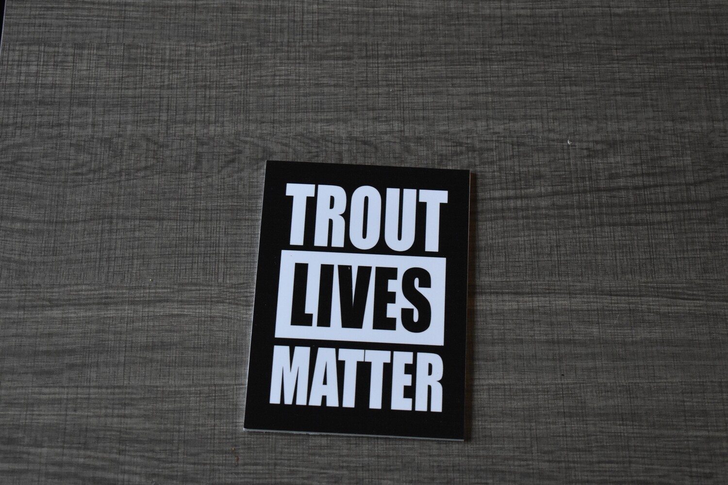 Trout lives matter sign