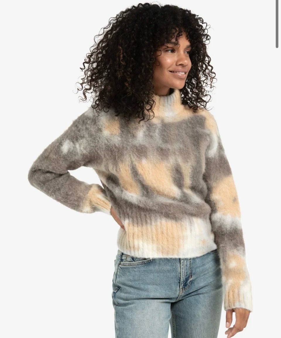 Knitted sweater with melange print and high neck