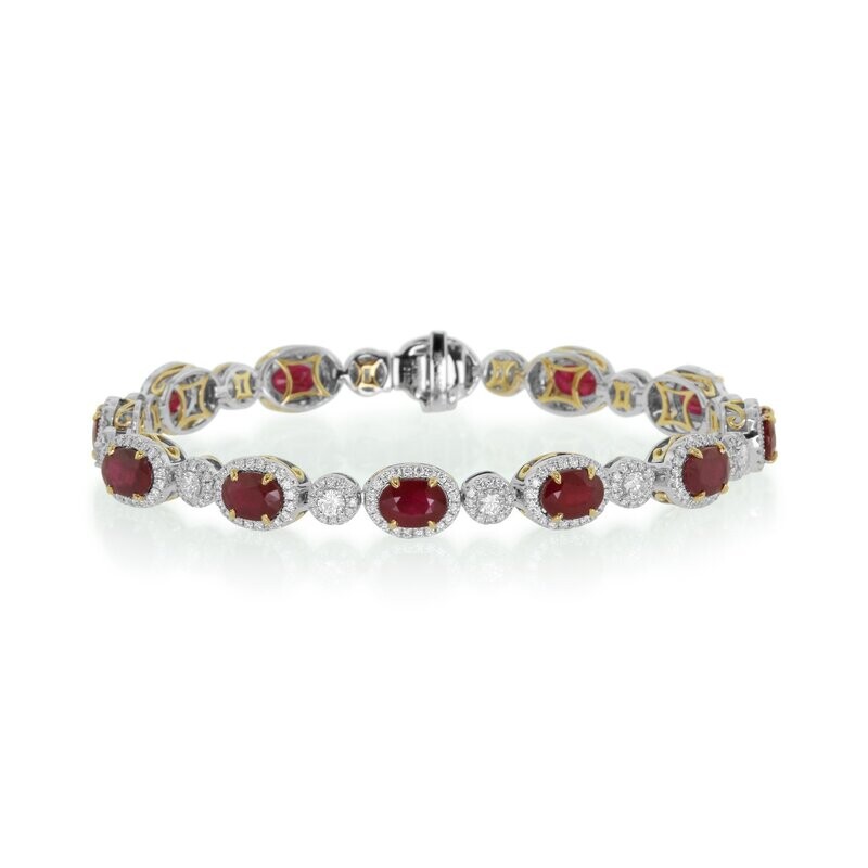 18kt White & Yellow Gold - Oval Ruby: 11.27ct - White Round Diamond: 3.00ct