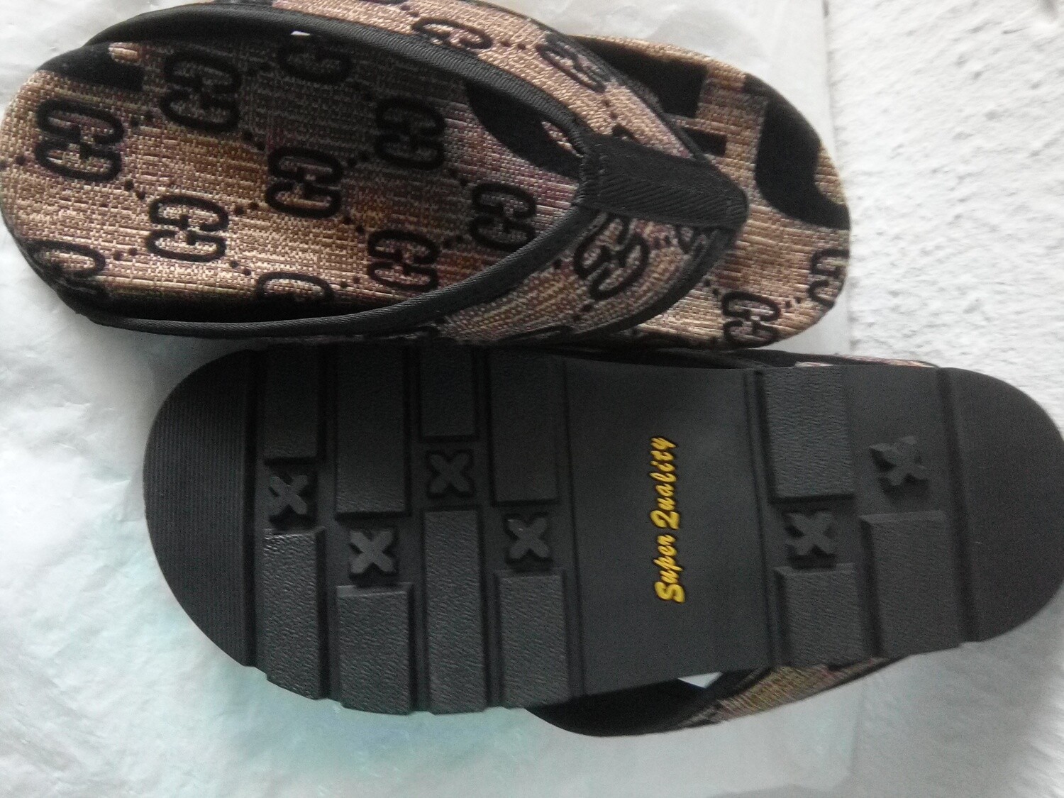 Gucci slippers.