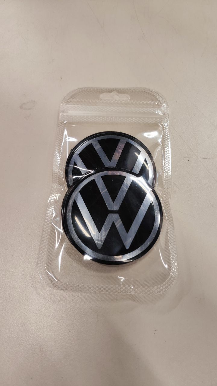 KL56044 - VELJEKLEEBISED VW 56MM UUS MUST 4TK.