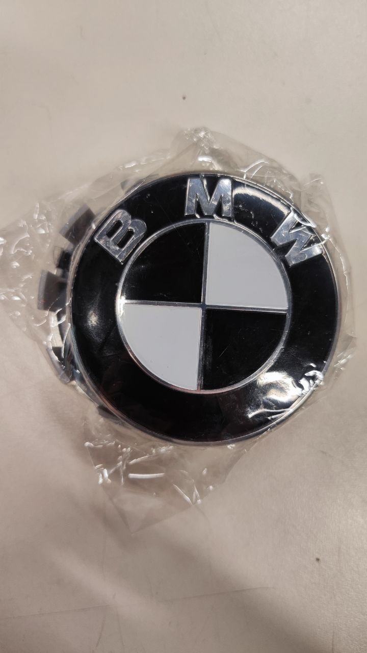 VELJEKAPSEL BMW 68MM MUST 1TK.