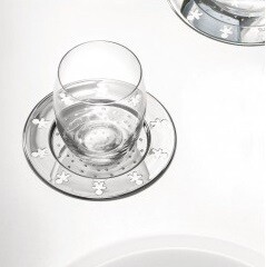 ALESSI 'girotondo' set/4 glasonderleggers rvs