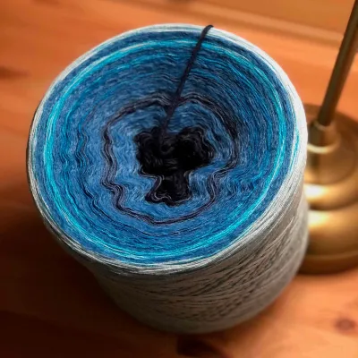 Woolpedia Milano Deep Ocean 4ply fluffy yarncake (modal)