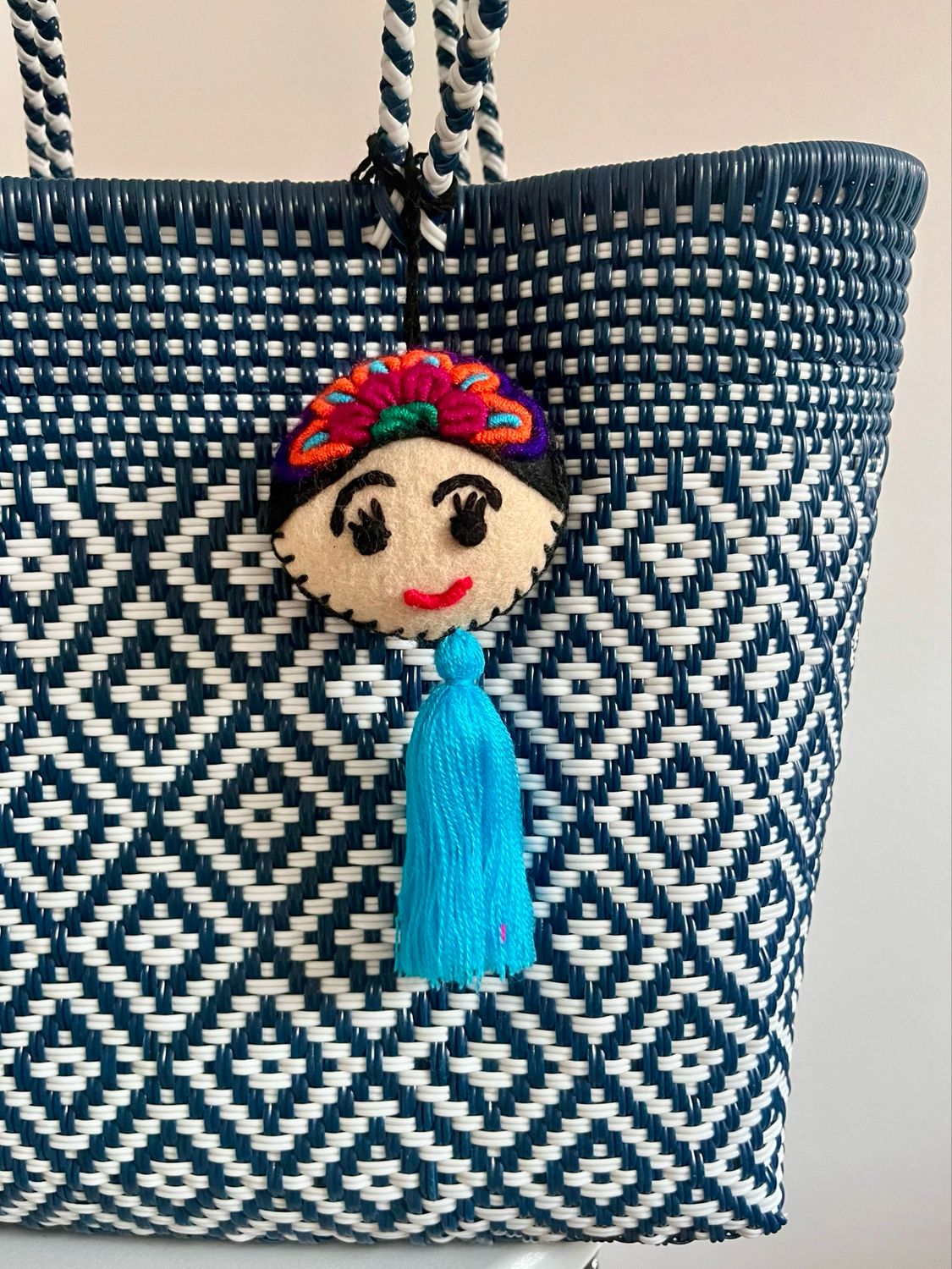 Tascheanhänger mit Pupe