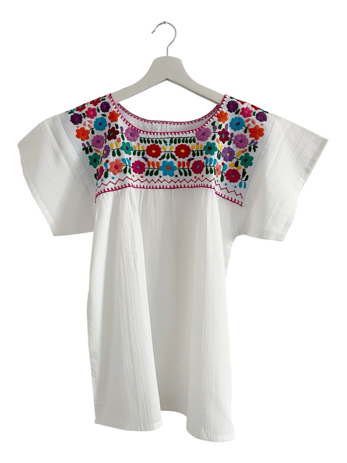 Exclusive Bluse für Damen mit Stickerei. Passend für jede Gelegenheit im Boho-Style. Die perfekte Bluse für Frühling und Somm