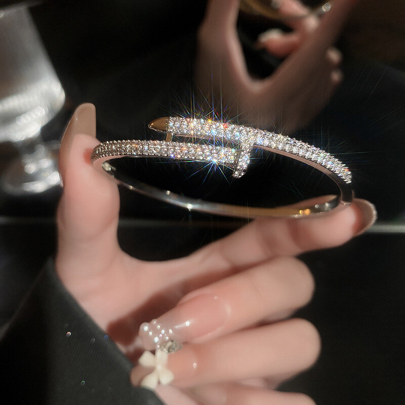Gold or silver plate and  cz crossover stylish nail bracelet