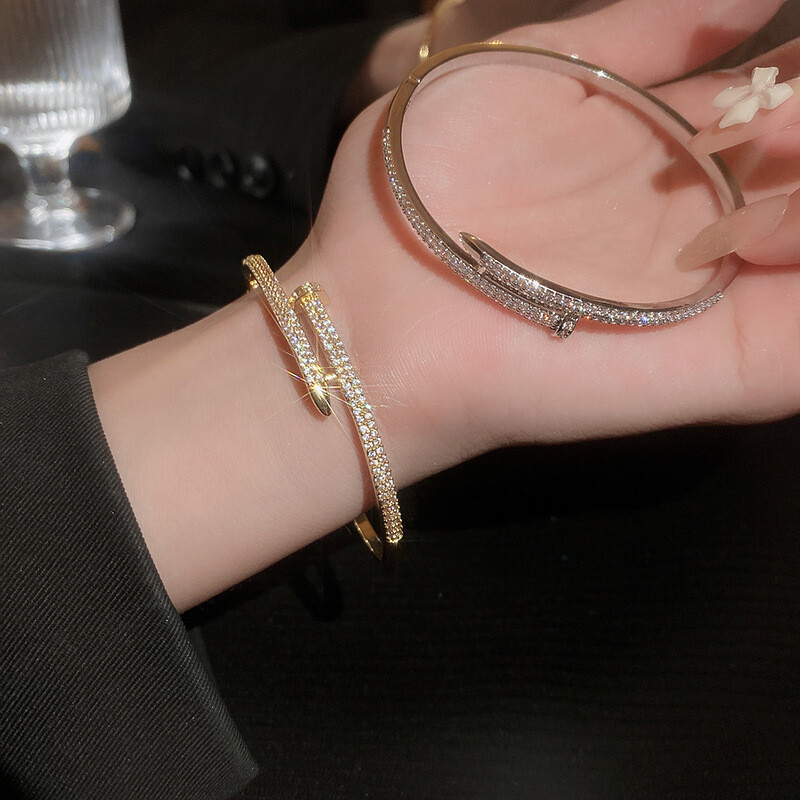 Gold or silver plate and  cz crossover stylish nail bracelet