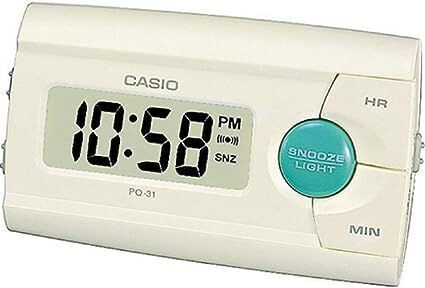 Réveil de voyage CASIO blanc cassé