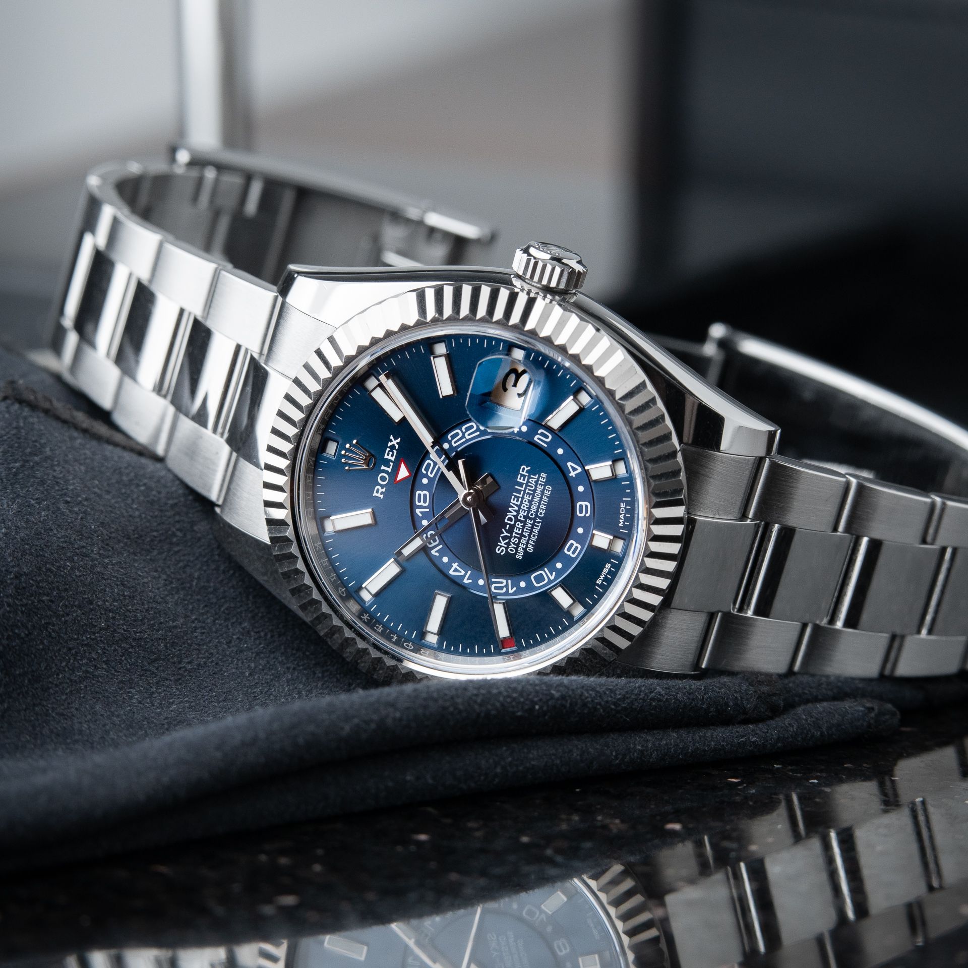 Rolex Sky-Dweller Blue Dial Steel Oyster Bracelet White Gold Bezel