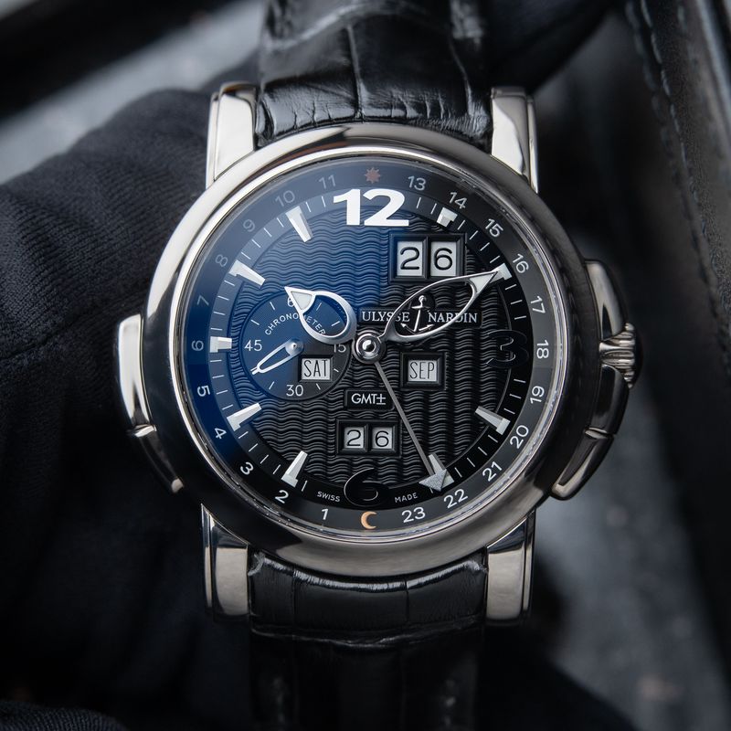 Ulysse Nardin GMT +/- Perpetual Calendar White Gold Black Dial 320-60-8/32