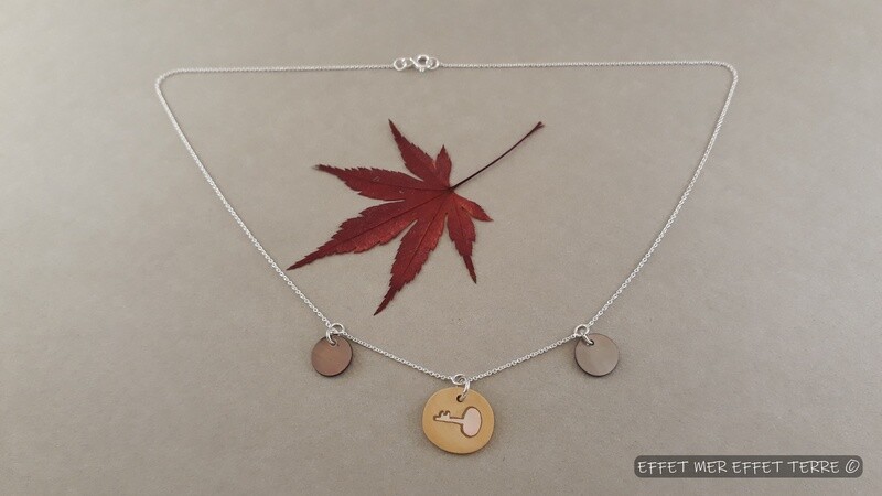 Pendentif argent et marqueterie clé