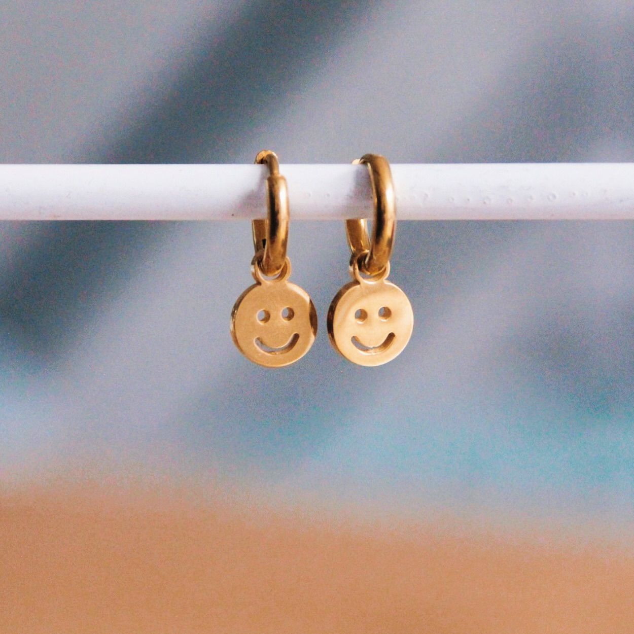 RVS creolen smiley - goud-