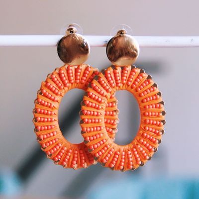RVS ovale statement oorring – oranje koraal/goud