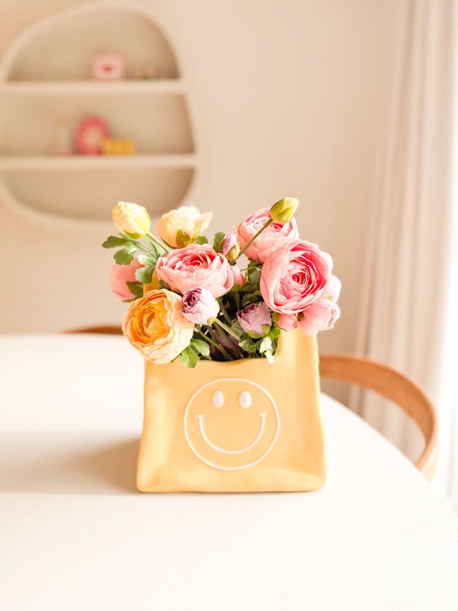 Vaas handtas geel Vaas handtas geel