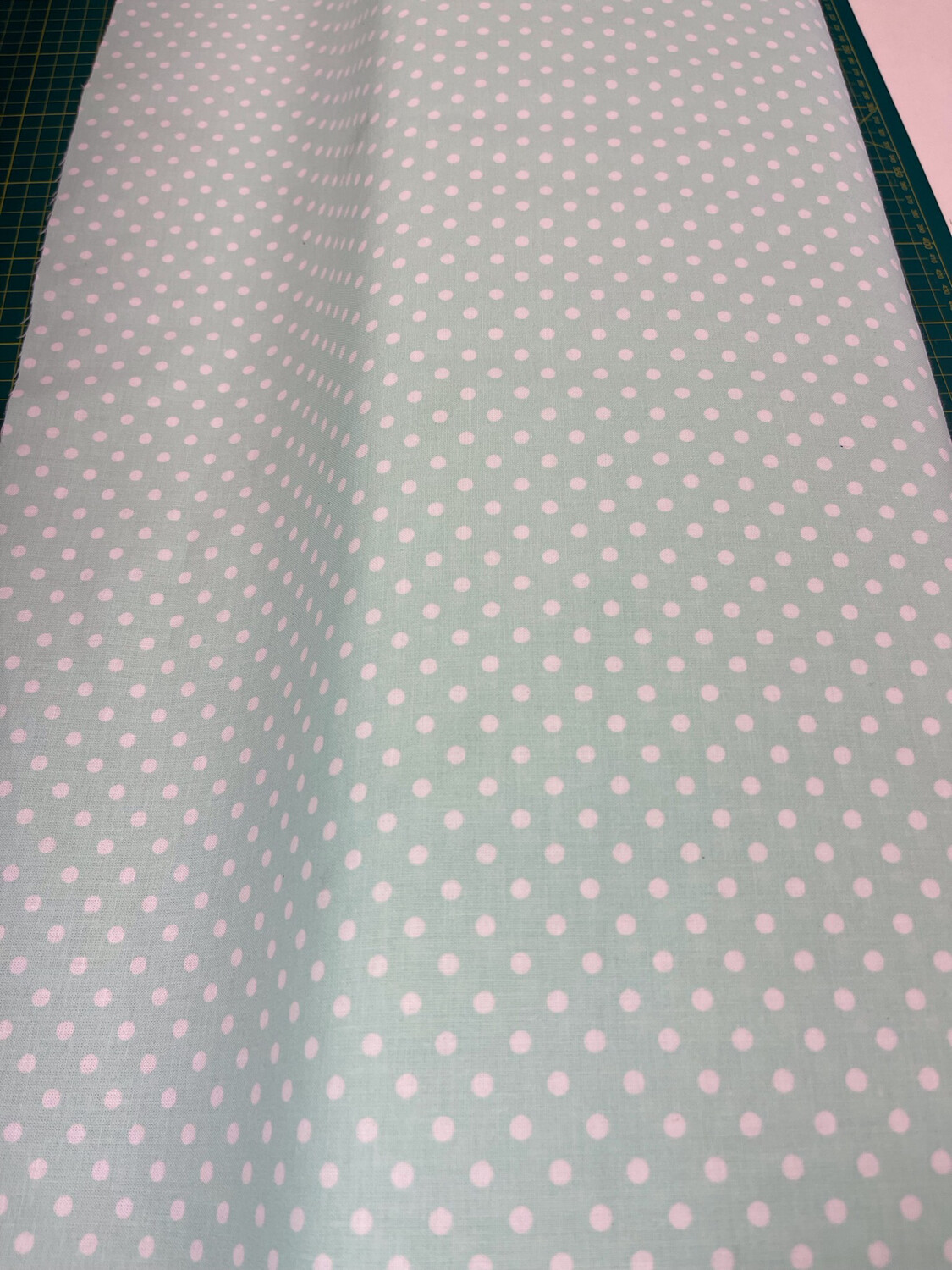 White Polka Dots On Green