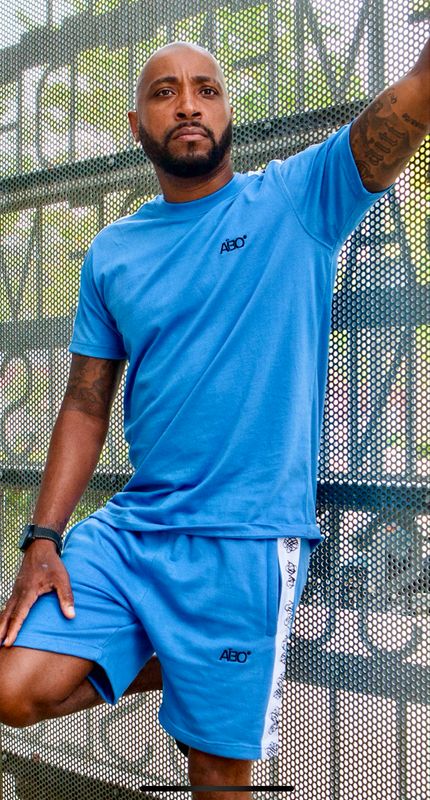 Ensemble sport - Aïbo - bleu ciel / bande blanche / motif symbole