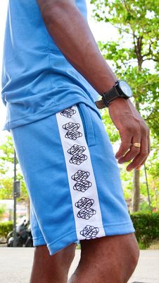 Ensemble sport - Aïbo - bleu ciel / bande blanche / motif symbole