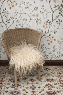 Lifestyle image showing how our felted fleece rug can be styled in a home.