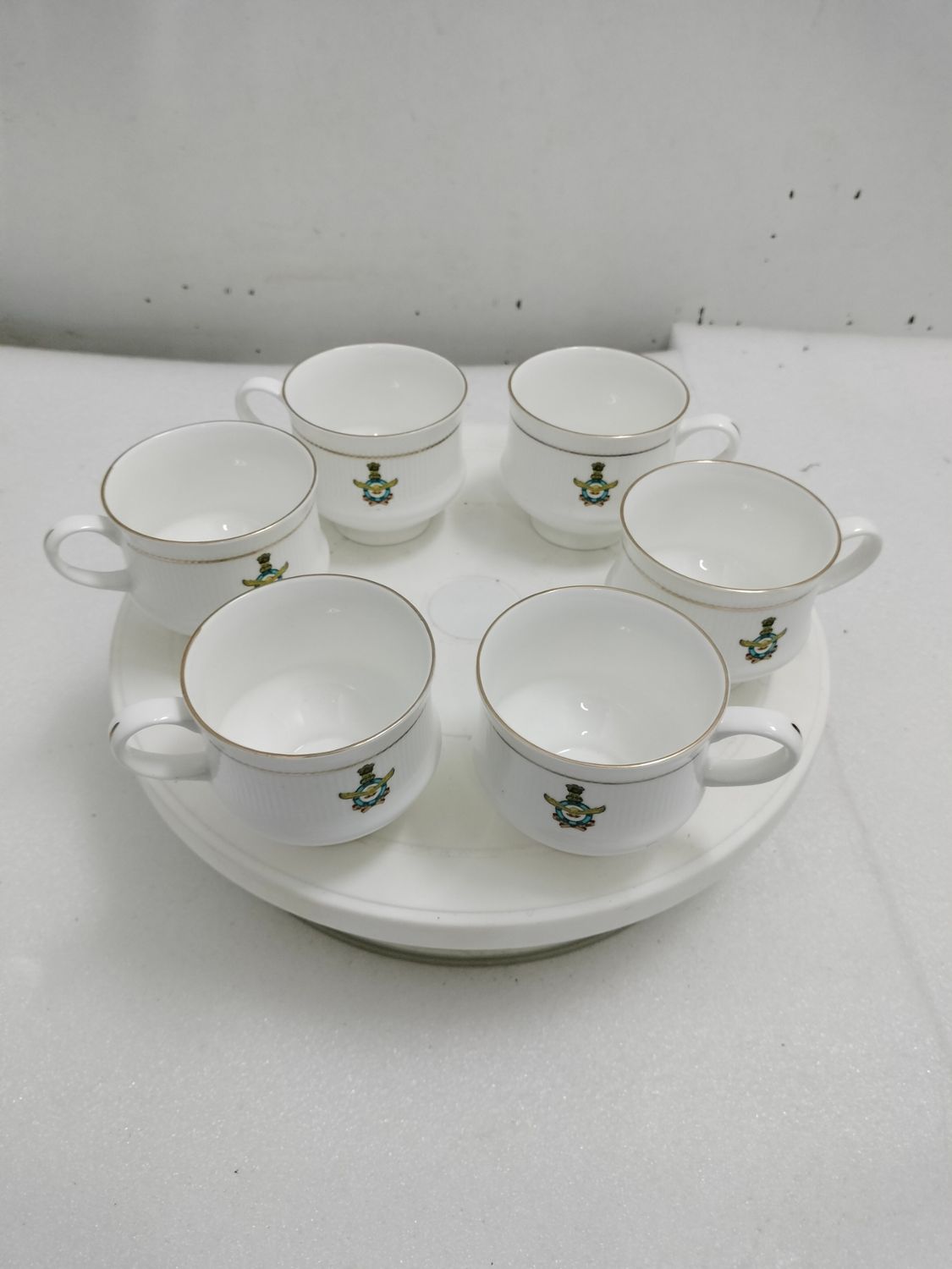 Coffee cups with defence logo