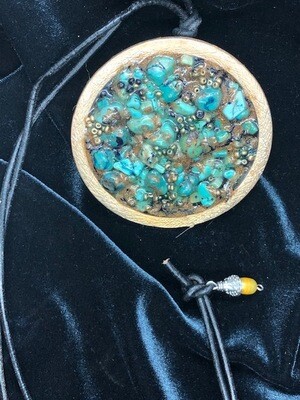 Large turquoise and golden pendant