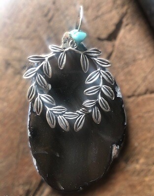 Natural translucent black agate and plated silver pendant