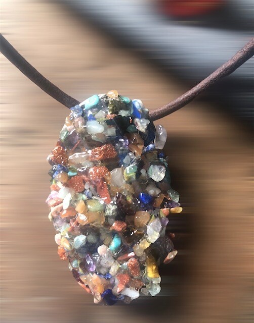 Heavy pendant covered in real gemstones