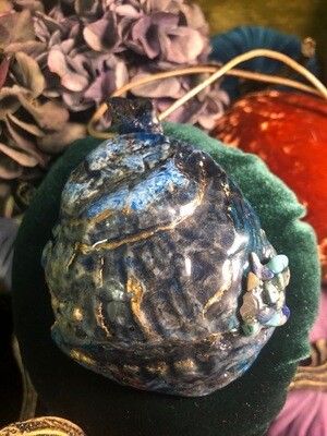 Teal oyster shell