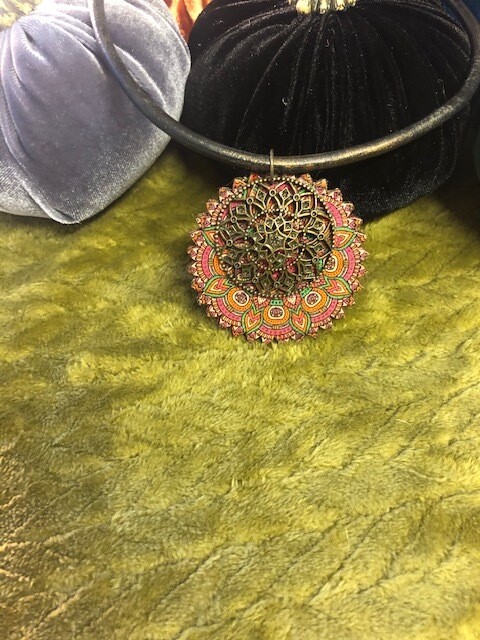Red and bronze mandala pendant