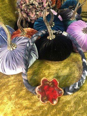 Large ceramic flower on braided tie dye necklace