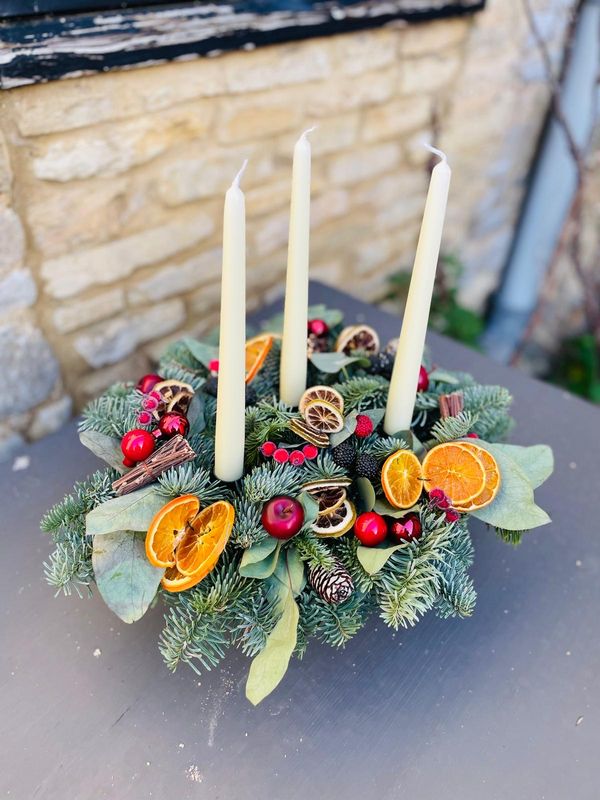 Winter warmth three taper table arrangement