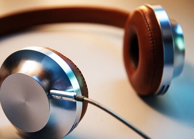 MP3 players, headphones, or wireless speakers for an adult with disabilities
