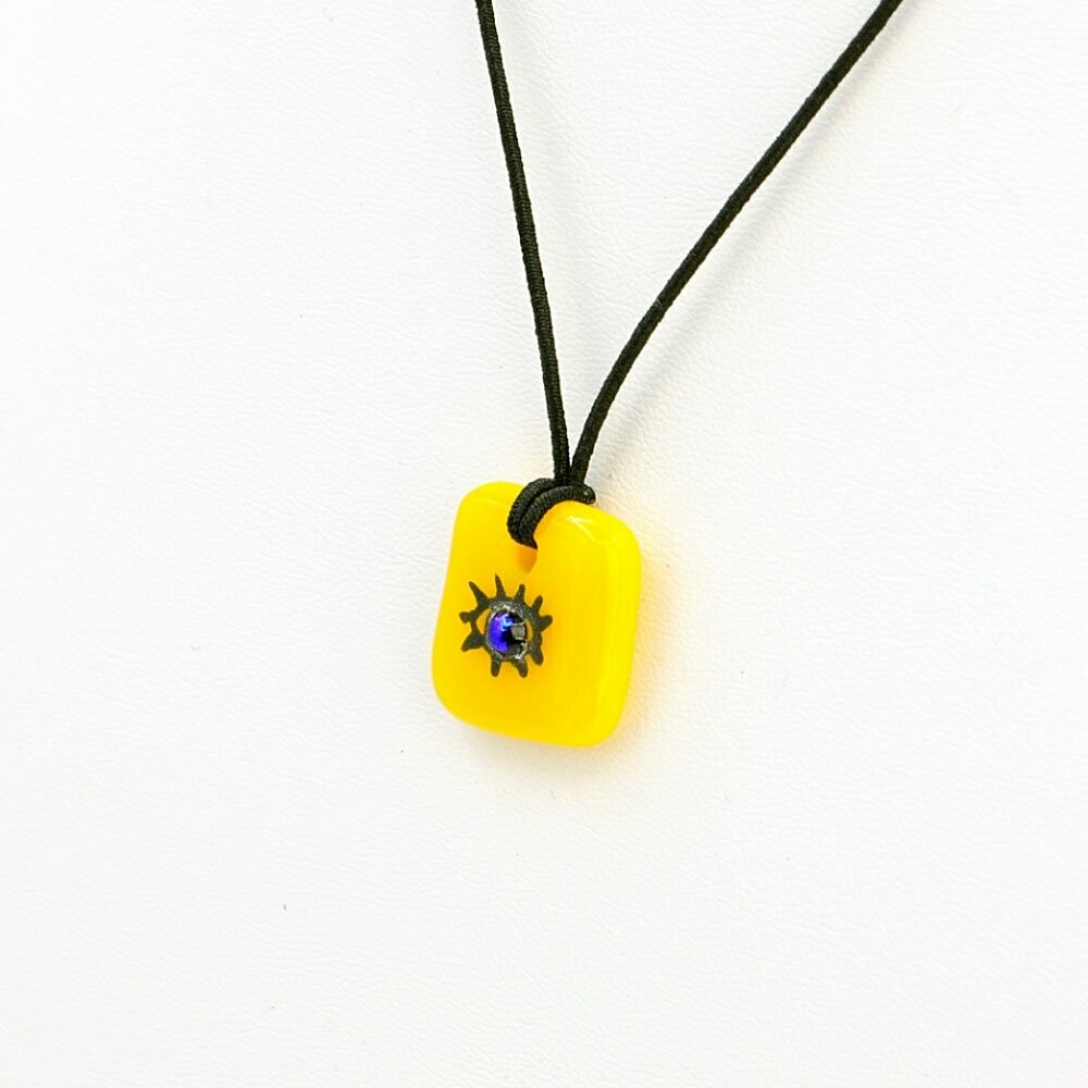 Collier enfant jaune œil