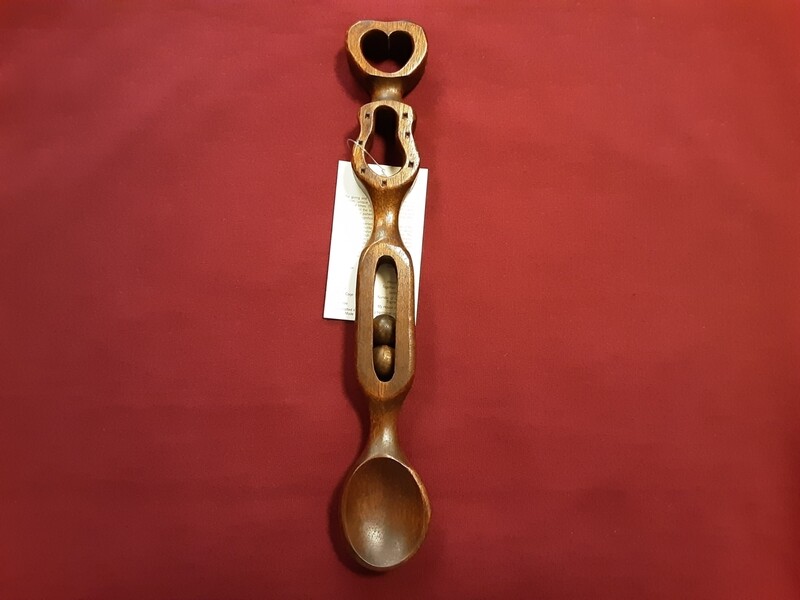 Heart, horseshoe and balls in cage Lovespoon