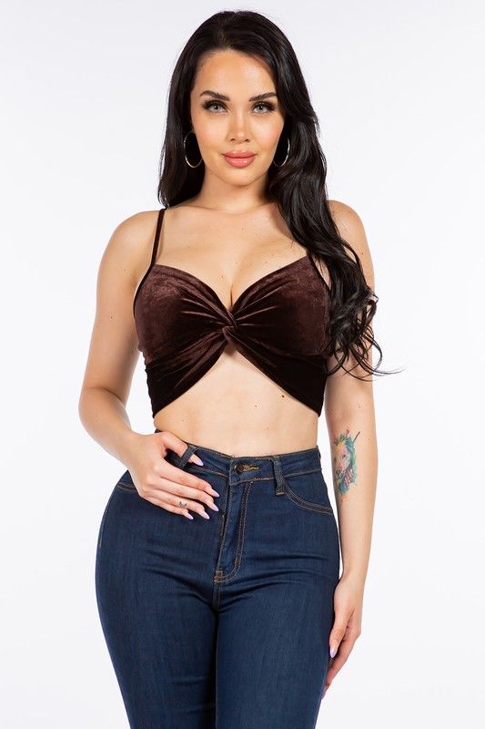 SLEEVELESS VELVET CROP TOP WITH TWISTED KNOT DETAIL.