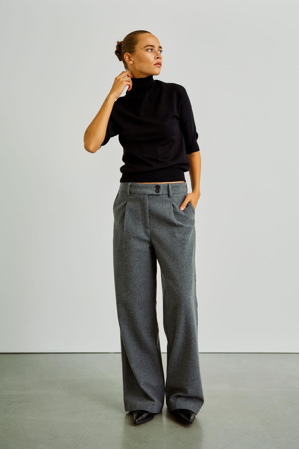 With Black pullover Cassandra