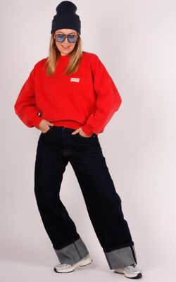 With Black turn-up jeans Hazel