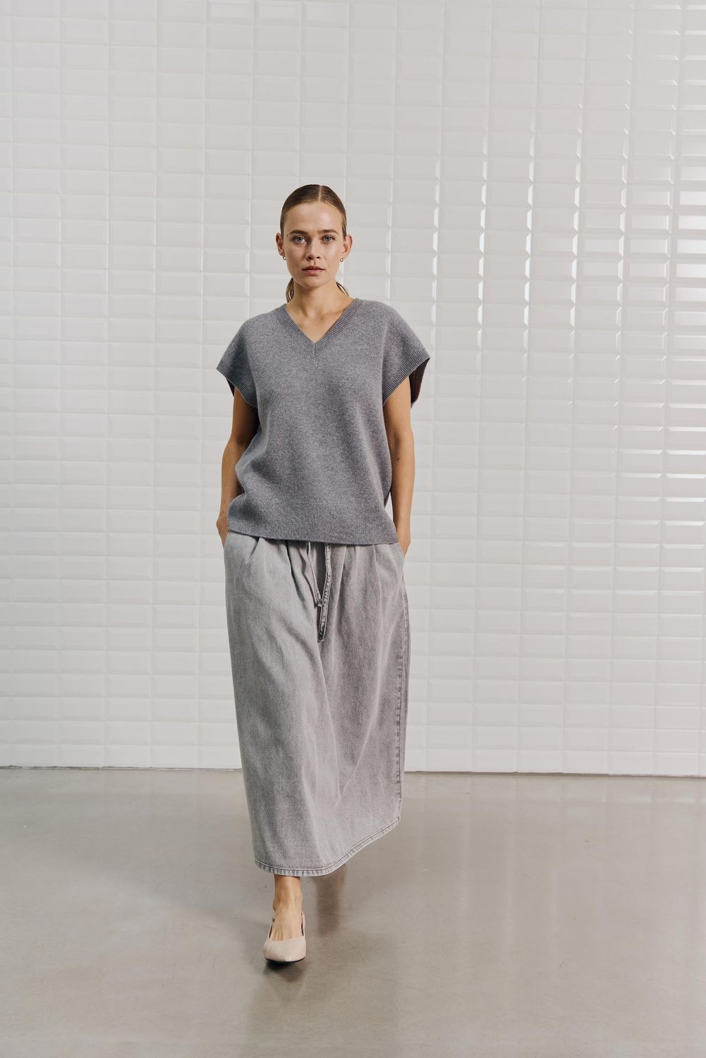 With Black maxi denim skirt Penelope