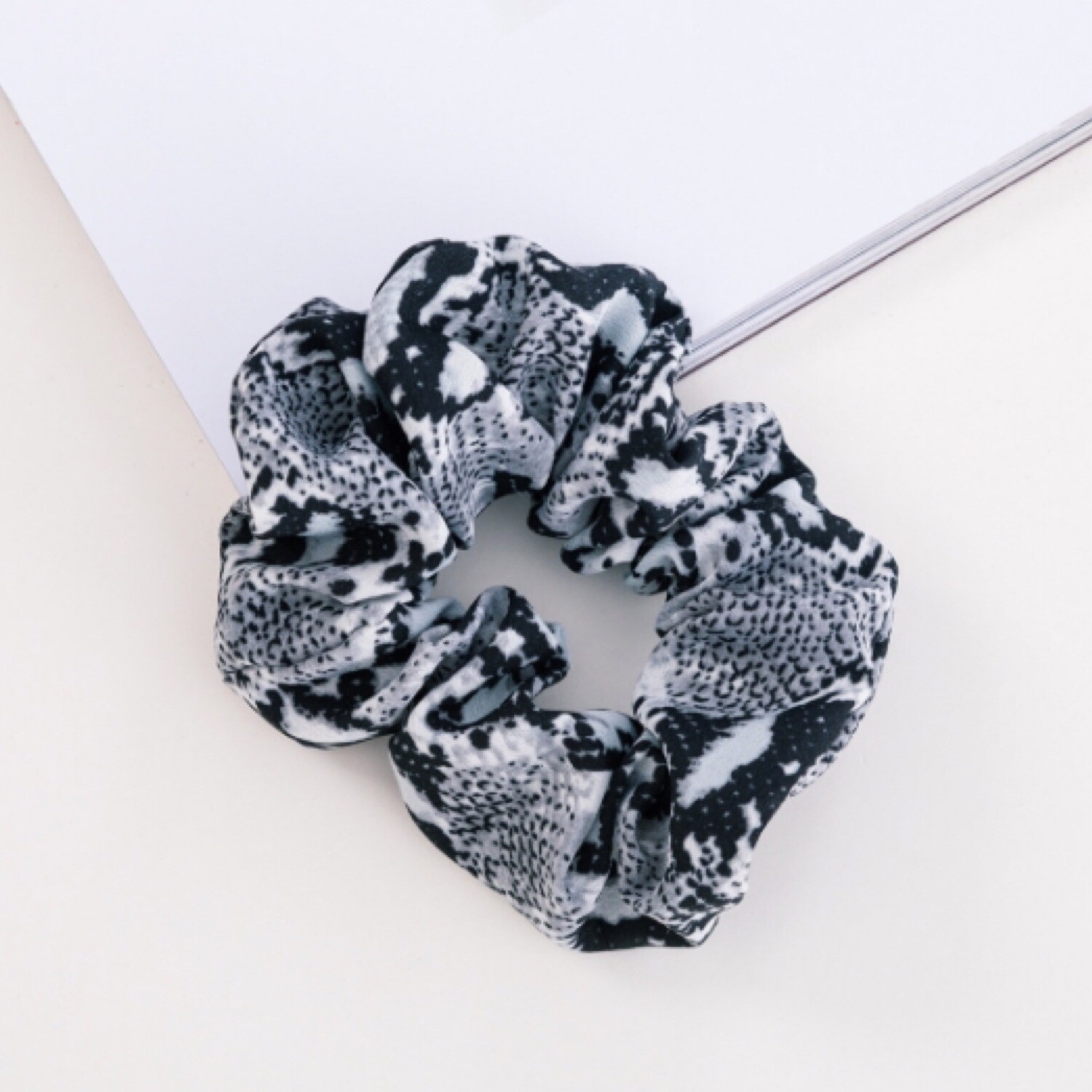 Suri in Phython Grey